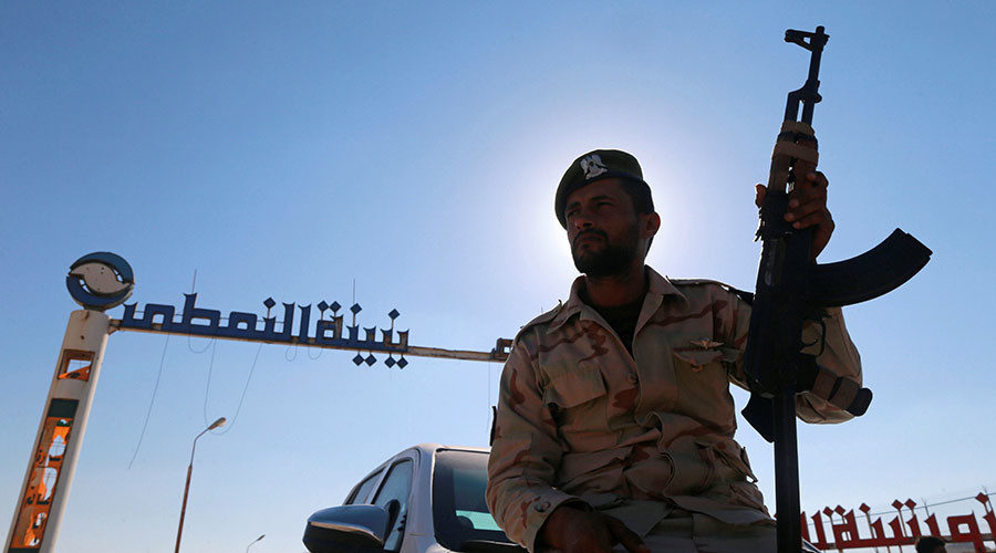 Click to enlarge Member of Libyan forces loyal to eastern commander Khalifa Haftar