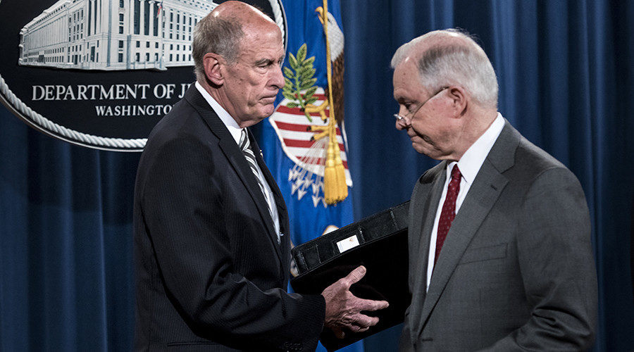Dan Coats (L) and US Attorney General Jeff Sessions
