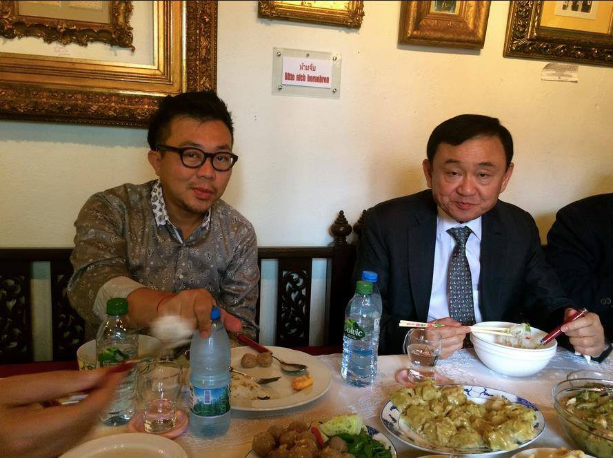 Click to enlarge Pavin Chachavalponpun shares a meal with Thaksin Shinawatra