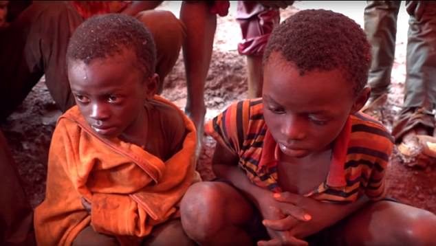 Click to enlarge child slave lobar congo Dorsen and 11-year-old Richard