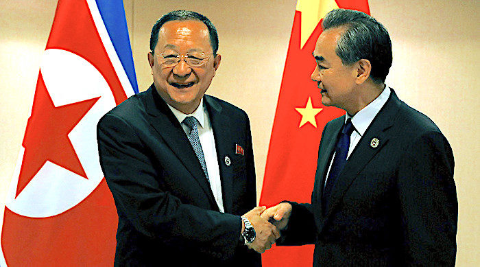 Click to enlarge FM Wang and FM Ri Yong Ho