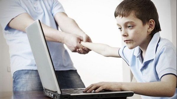 dragging kid from computer