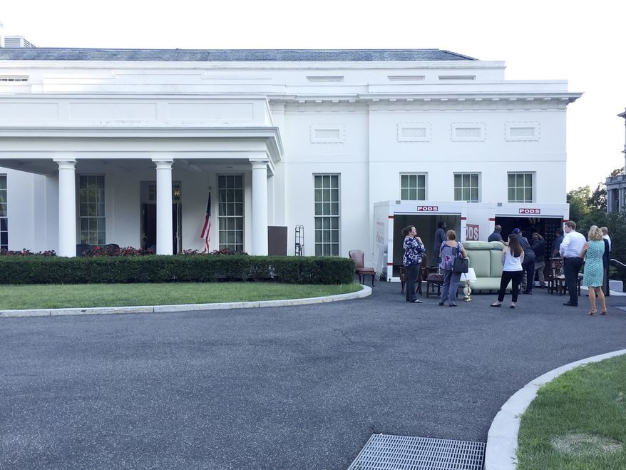 PODS are loaded from the West Wing of the White House in Washington, Friday, Aug. 4, 2017. The West Wing is getting a renovation while President Donald Trump is away on vacation