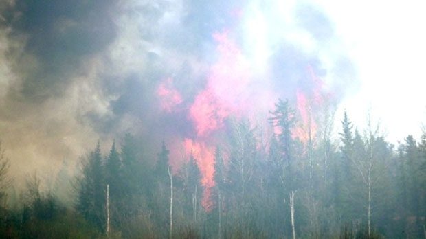 Click to enlarge A forest fire near Norway House, Man. is shown in this photo from 2008.