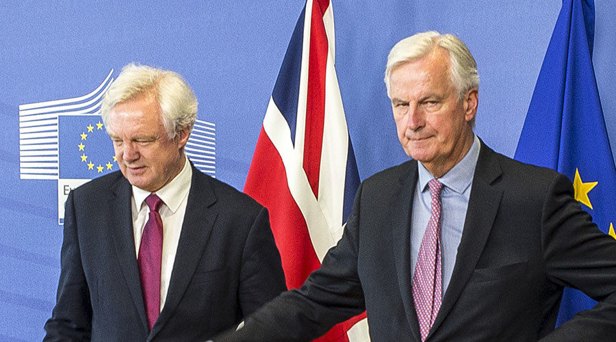 Click to enlarge Britain's Secretary of State for Exiting the European Union, David Davis (L) and Michel Barnier