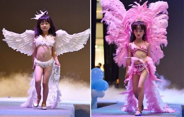 Click to enlarge Little girls model lingerie in 'Victoria's Secret'-style show