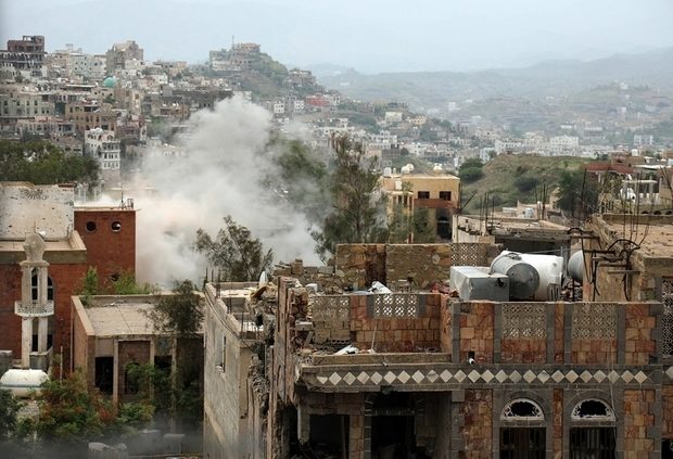 Smoke rises from an air attack in Taiz