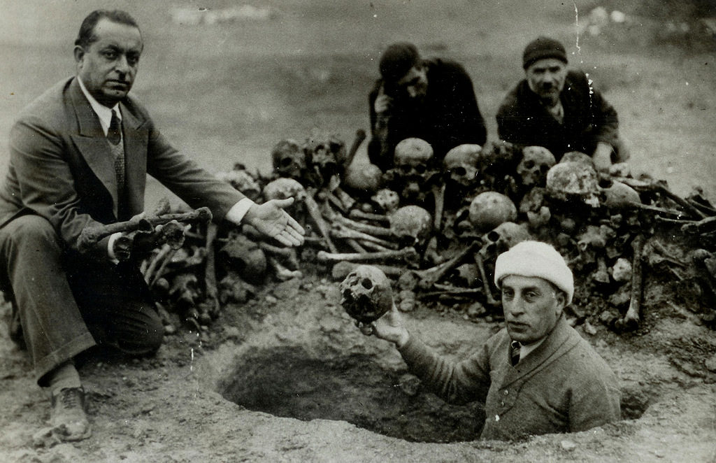 Click to enlarge A group of men excavate the remains of victims of the Armenian genocide in modern day, Deir ez-Zor, Syria, 1938
