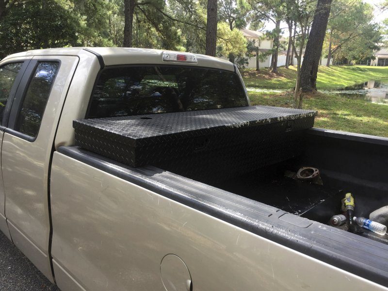Florida Department of Agriculture shows a truck outfitted with a large tank