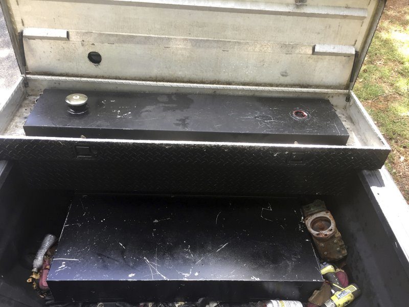 Click to enlarge truck outfitted with a large tank used to syphon gas from gas stations