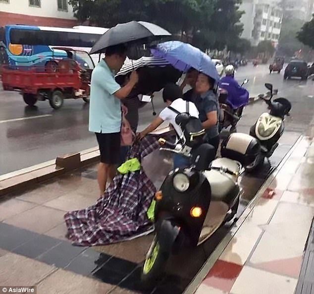 Others tended to a pedestrian who was also hit by the lightning and was taken to hospital