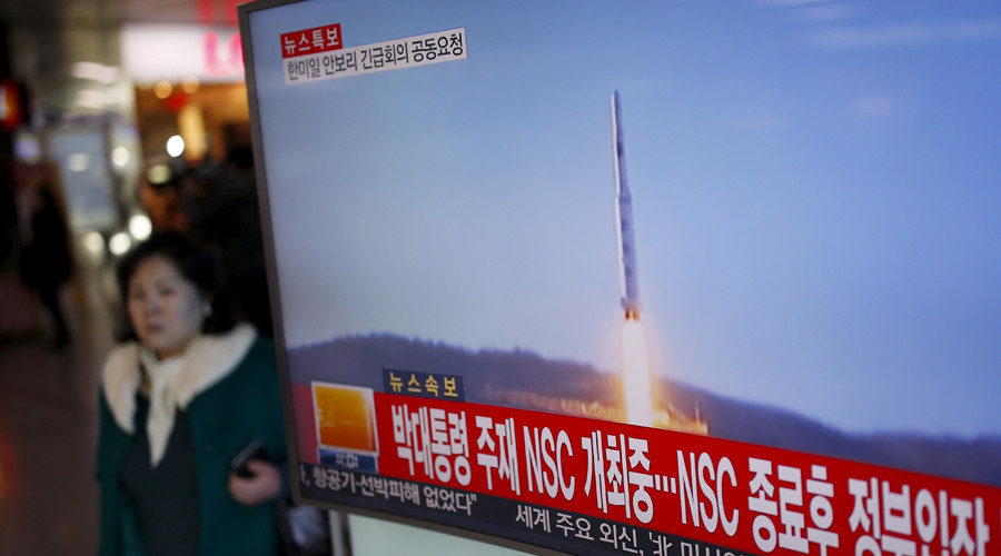 TV screen broadcasting a news report on North Korea's long range rocket launch
