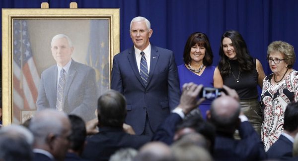 Mike Pence poses for a photo with his family