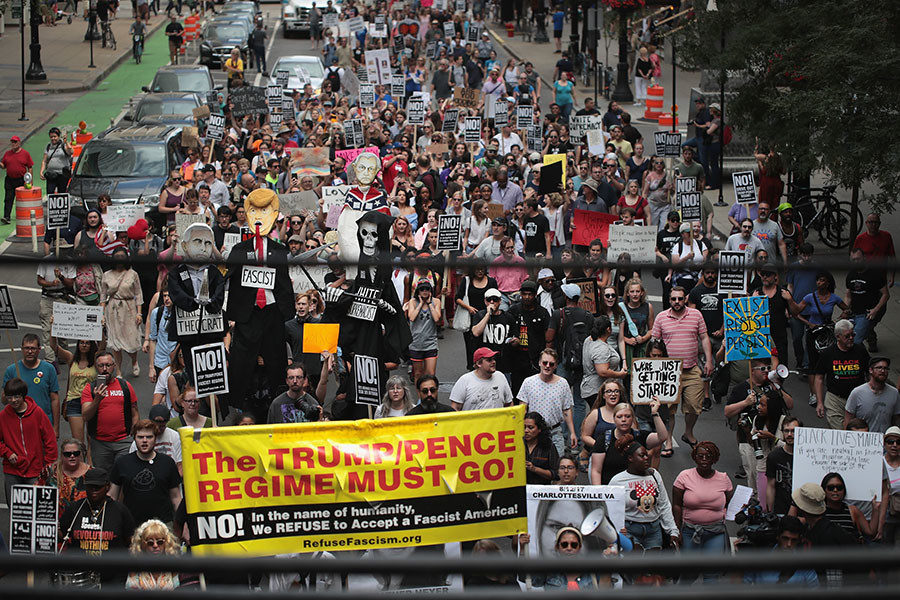 Demonstrators march downtown to protest the alt-right movement and to mourn the victims of yesterdays rally in Chicago, Illinois.