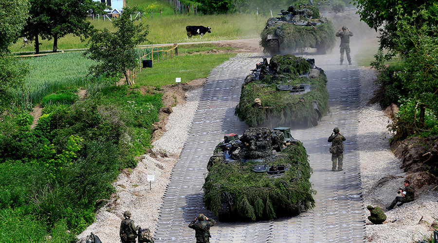 German Army Leopard tanks cross the Neris river during the 2017 Iron Wolf exercise