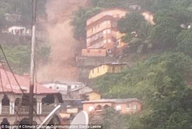 Click to enlarge The mudslide came crashing down a mountain side amid torrential heavy rain in the area