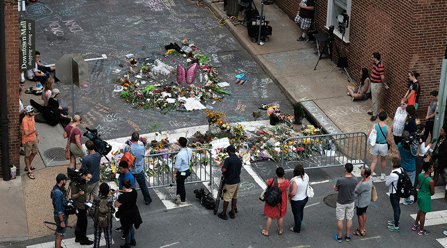 Mourners at the scene of the car attack in Charlottesville
