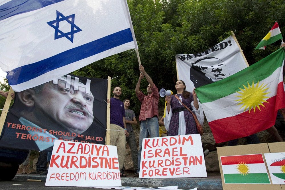 Ethnic Kurdish Israelis protest outside the Turkish embassy in Tel Aviv