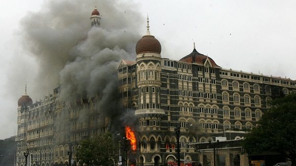 Click to enlarge The Taj Mahal Palace Hotel is seen engulfed in smoke during the 2008 Mumbai terror attacks