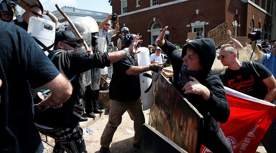 Members of white nationalists clash against a group of counter-protesters in Charlottesville