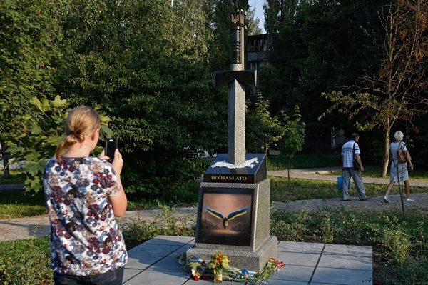 Kiev statue with video game Diablo graphic