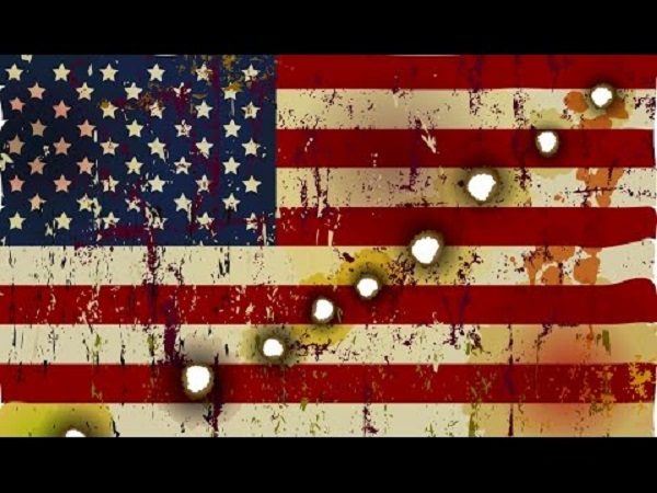 US flag with bullet holes