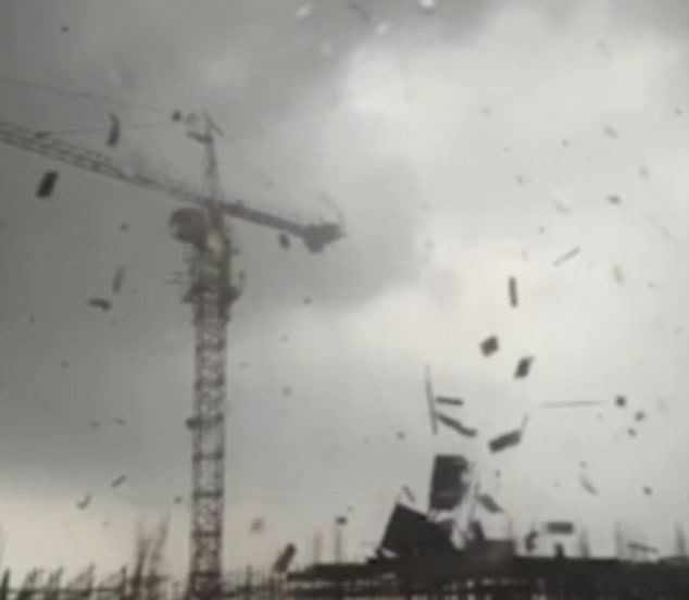 iles and other objects can be seen ripped from the residential area in northern China