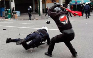 Beating cops with clubs for breaking up a riot