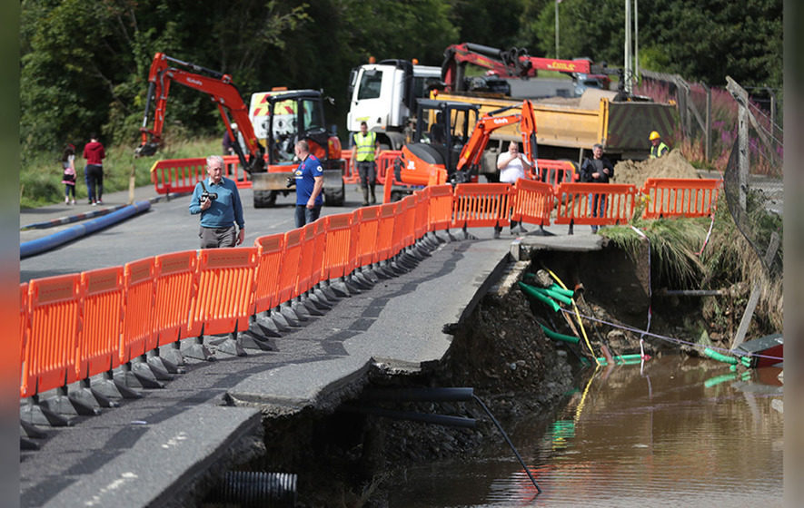 Damage to a road next to the river Faughan in Drumahoe, Co Derry.