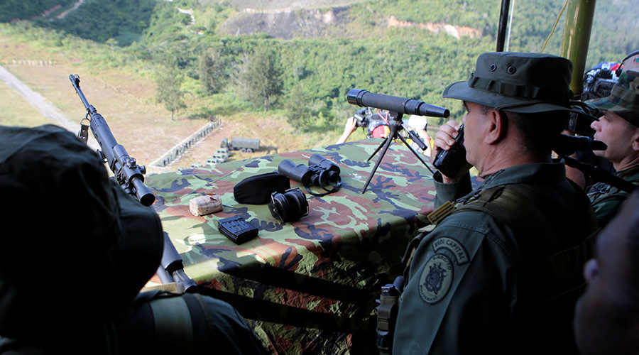 Venezuela's Defense Minister Vladimir Padrino Lopez attends snipers drills during military exercises in Caracas