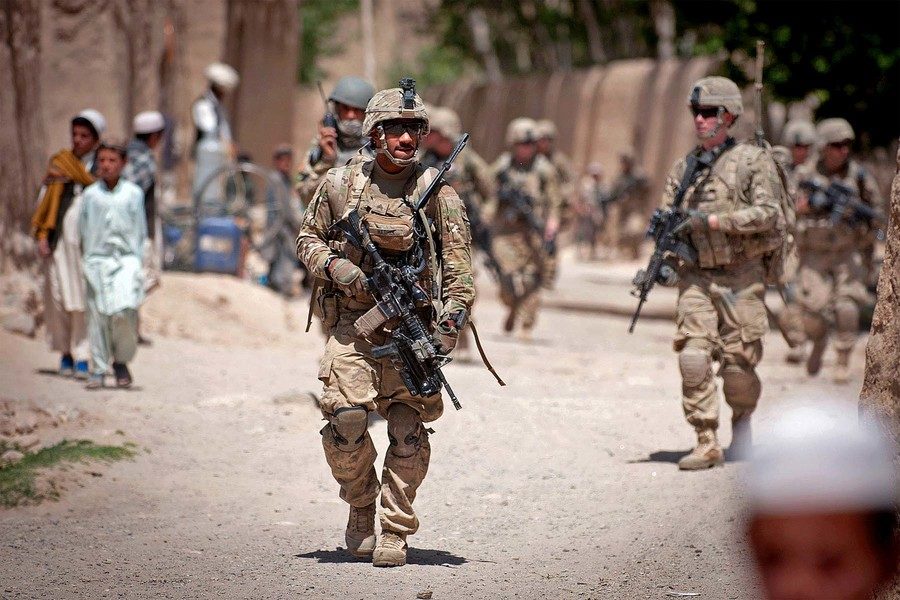 U.S. paratroopers patrol a village near Forward Operating Base Arian in Afghanistan's Ghazni province, May 29, 2012