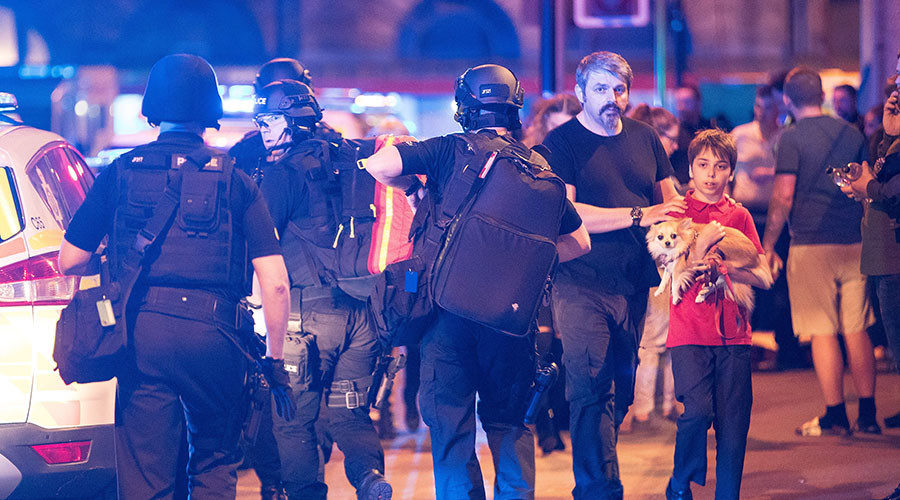 Manchester, UK. Police and other emergency services are seen near the Manchester Arena after reports of an explosion.