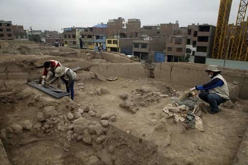Click to enlarge Archeologists work at the site where 16 tombs belonging to 19th century Chinese immigrants were discovered