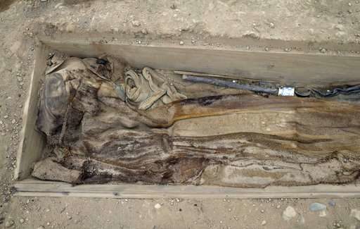 Click to enlarge An opium pipe sits next to the remains of one of the 19th century Chinese immigrants