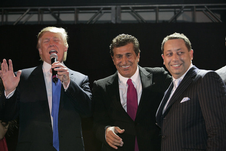 Donald J. Trump with Felix H. Sater, right, and Tevfik Arif at the official unveiling of Trump SoHo in September 2007