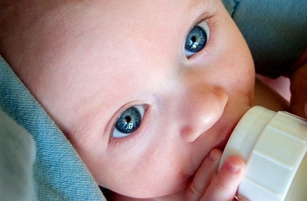Click to enlarge bottle feeding baby
