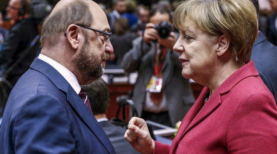 Click to enlarge Martin Schulz (L) and German Chancellor Angela Merkel