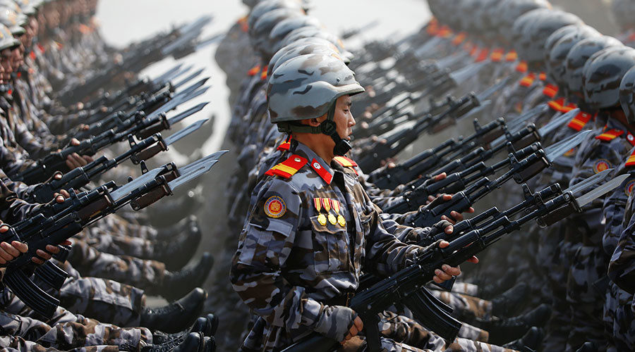 North Korean soldiers march during a military parade