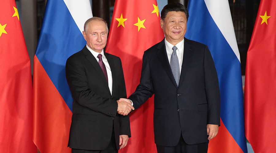 Vladimir Putin and Xi Jinping