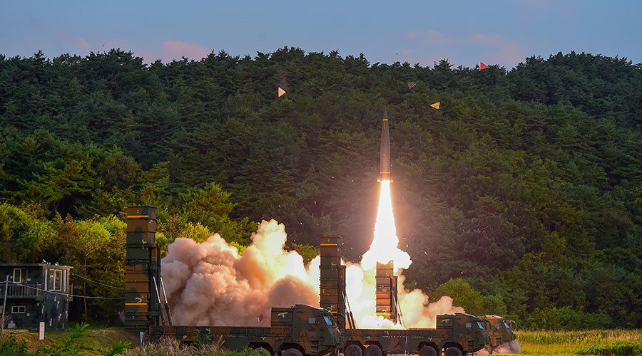 Click to enlarge South Korean troops fire Hyunmoo Missile into the waters of the East Sea at a military exercise
