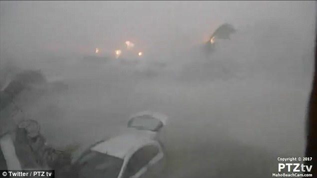Click to enlarge Princess Juliana Airport, pictured in the midst of the storm, suspended all operations at the airport on Tuesday as a precaution before Hurricane Irma hit