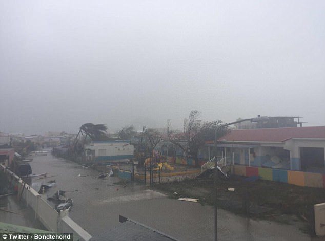 Hurricane Irma has caused torn off rooftops and knocked out all electricity across Saint Martin (pictured), as well as on the French island of Saint Barthelemy