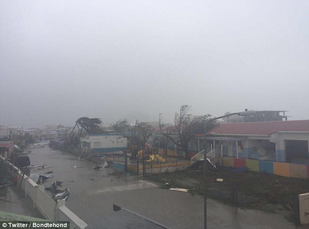 Click to enlarge Hurricane Irma has caused torn off rooftops and knocked out all electricity across Saint Martin (pictured), as well as on the French island of Saint Barthelemy