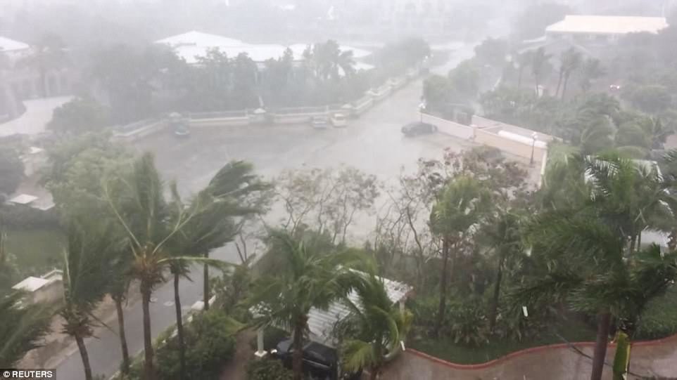 The powerful category 4 storm made landfall in the British Overseas on Thursday evening and isn't expected to slow down through Friday morning. Pictured is the island of Providenciales