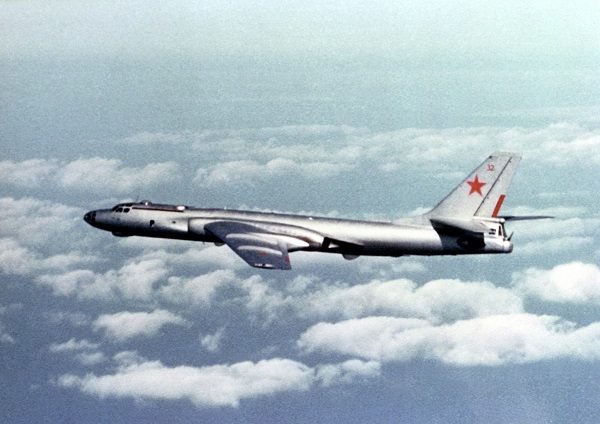 Click to enlarge Air-to-air left side view of a Soviet TU-16 Badger E aircraft