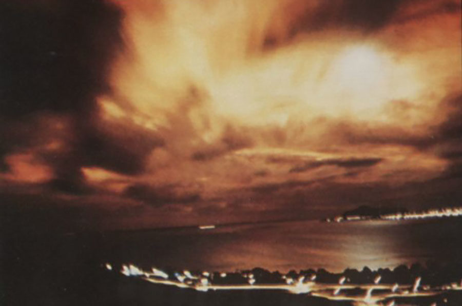 The explosion of Starfish Prime seen through a thick layer of clouds from Honolulu