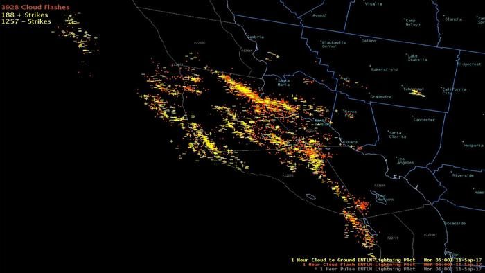 A volatile storm brewing over Southern California produced nearly 40,000 lightning strikes and threatened to bring more rain Monday, forecasters said