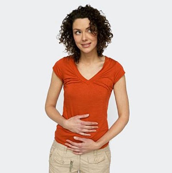 woman holding stomach
