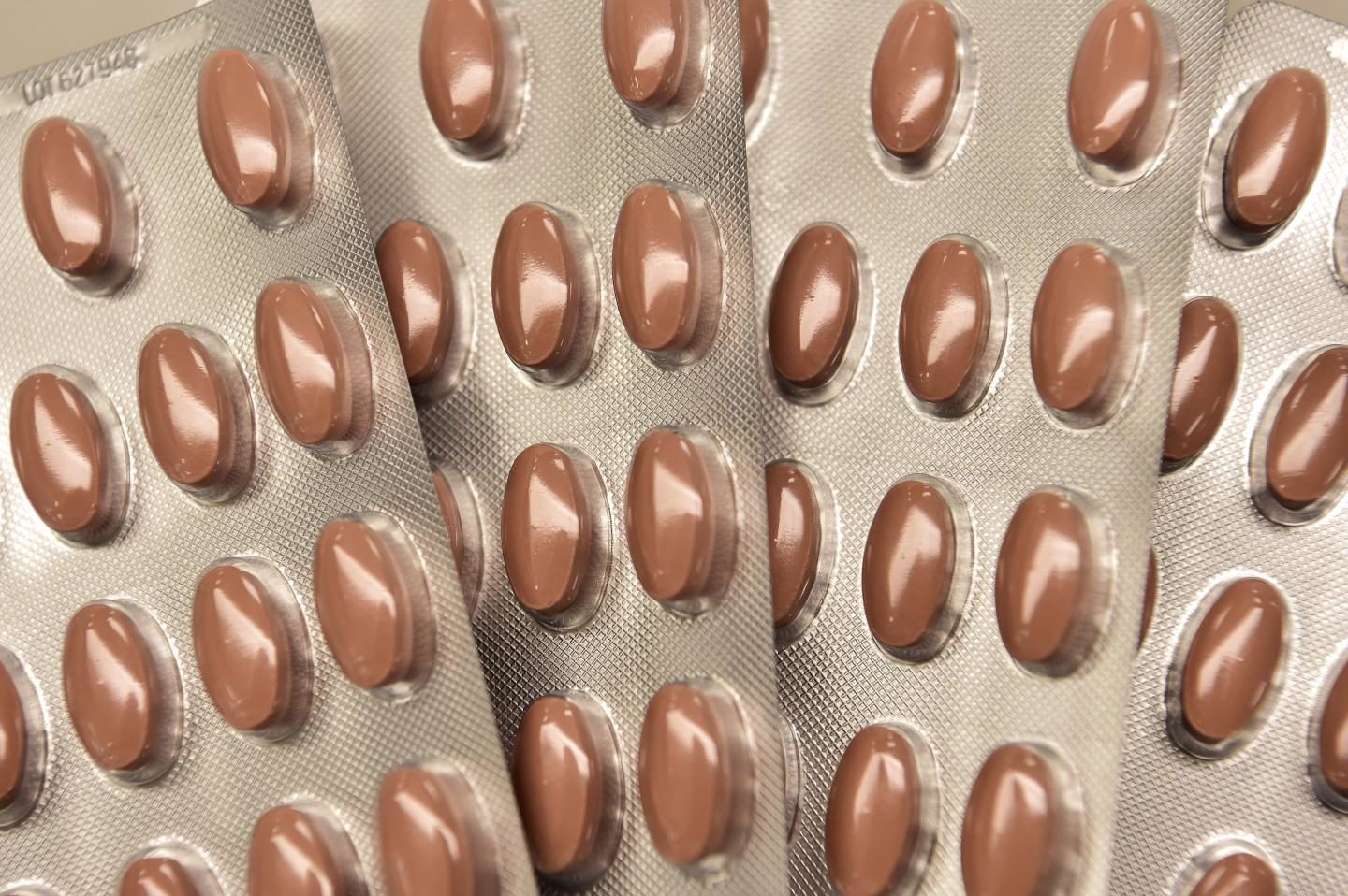 Click to enlarge packets of pills