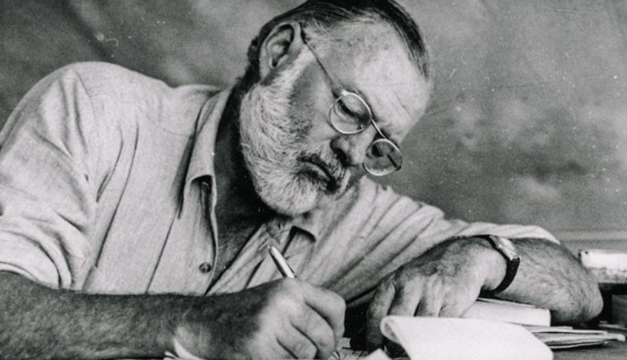 Click to enlarge man writing journaling
